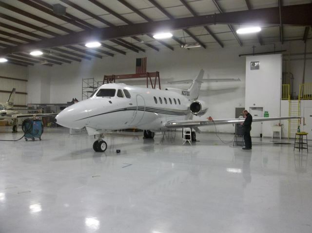 Hawker 800 (N237DX) - Premier Flight hangar.