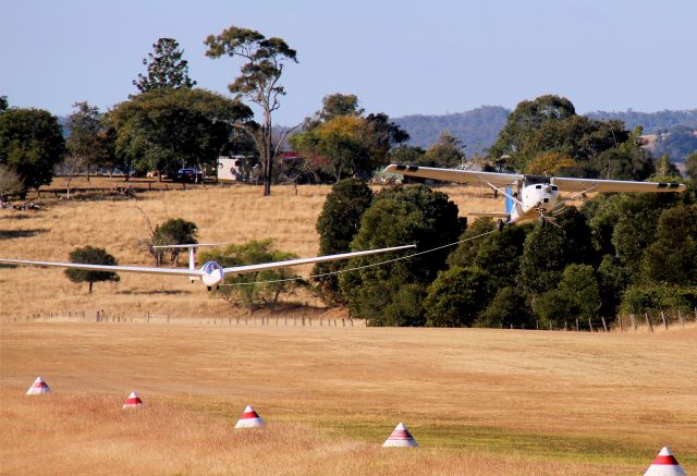 VH-BGE — - Sequence showing Cessna 150 tug tow launch at Boonah Queensland. Tug has 180hp engine.Glider is Schleicher ASK 21 of Boonah club