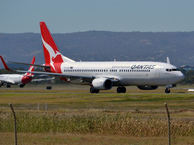 Boeing 737-800 (VH-VZB) - On taxi-way heading for take off on runway 05. Thursday 12th April 2012.