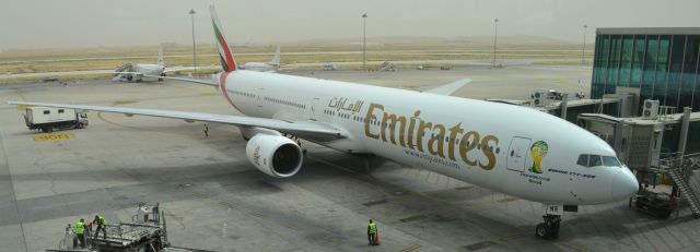 BOEING 777-300 (A6-EMR) - Preparing for pushback to return to OMDB