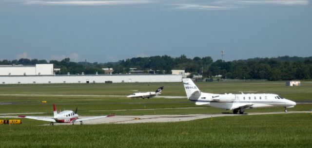 Cessna Citation Excel/XLS (N844JS) - Taxiing for the departing runway is this 2003 Cessna Citation Excel 560XLS in the Summer of 2021.