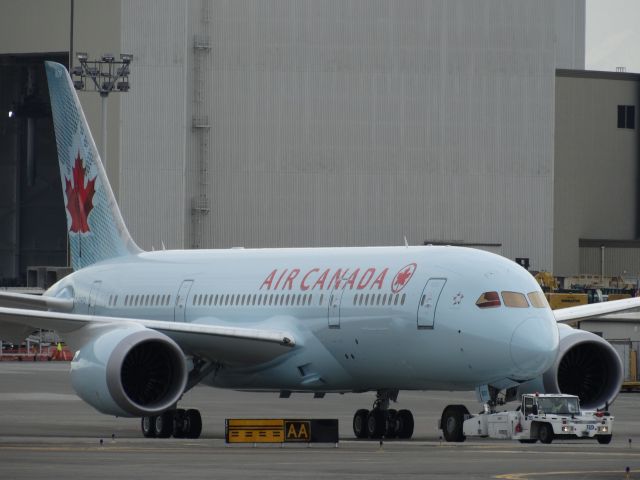 Boeing 787-8 (C-GHPQ) - The 1st Air Canada (C-GHPQ) Boeing 787 Dreamliner is moved out of the paint shop on factory grounds and is taxied close by to the EMC. Enjoy the sounds of this large industrial environment and the close up views as this new Boeing 787 Dreamliner passes by. Air Canada is one step closer to receiving an amazing plane.br /br /Watch: a rel=nofollow href=http://www.youtube.com/watch?v=xuC6nwe17Dohttps://www.youtube.com/watch?v=xuC6nwe17Do/a