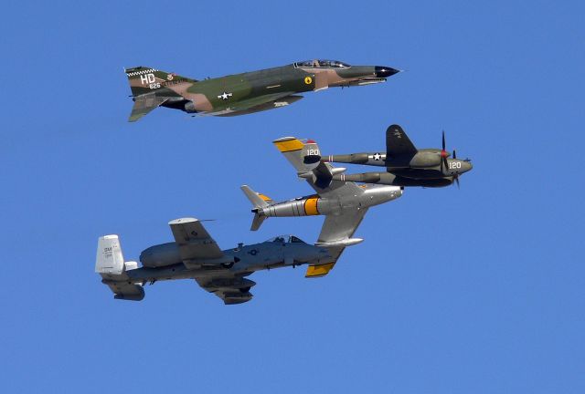 — — - Heritage flight over Nellis 2009. P-38, F-86, A-10 and the F-4.