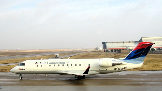 Canadair Regional Jet CRJ-200 (N445SW) - This photo was taken in 2002 when Delta still had a hub at DFW.  This plane was new, having been delivered just 6 months before the photo.