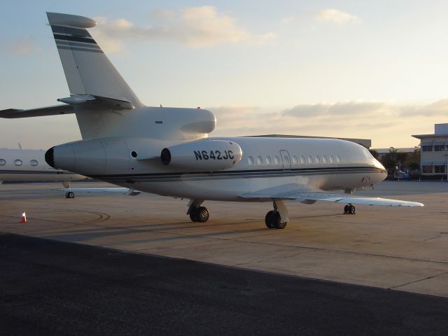 Dassault Falcon 900 (N642JC) - This Falcon 900 awaits for departure as the sun rises in Naples FL.