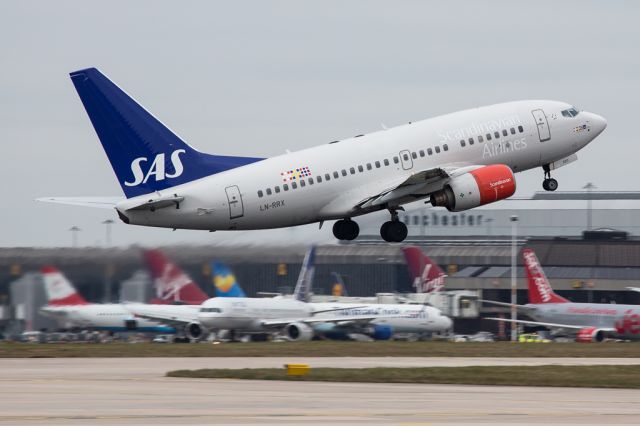 BOEING 737-600 (LN-RRX) - SAS4608 departing for Oslo with a variety of other aircraft in the background.