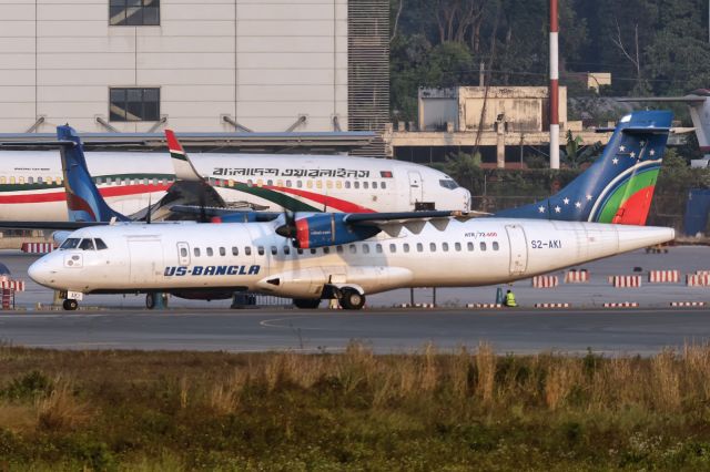 Aerospatiale ATR-72-600 (S2-AKI) - 27th December, 2024: Flight BS 188 from Saidpur taxiing to the ramp at Dhaka's Zia International Airport. Background shows Biman's half-scavenged S2-AFM B738. 