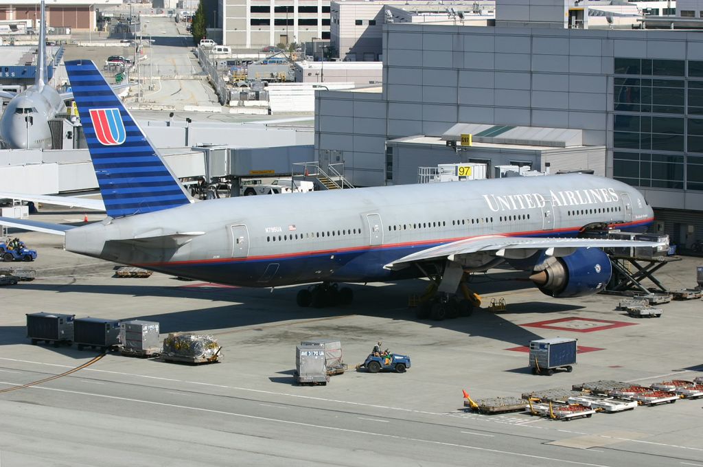 Boeing 777-200 (N795UA) - KSFO - Apr 15, 2005 shows UAL 777-2 being readied for the next flight at International Terminal G. I do not know where the next flight would be headed.