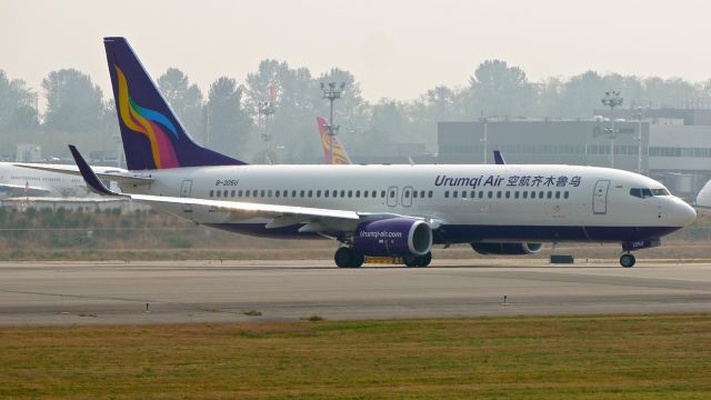 Boeing 737-800 (B-205U) - BOE909 taxis onto Rwy 16R during a C1 flight from KBFI on 8.15.18. (B737-84P(WL) / ln 7094 / cn 64855). Visibility is approx. 3 miles due to wildfire smoke.  