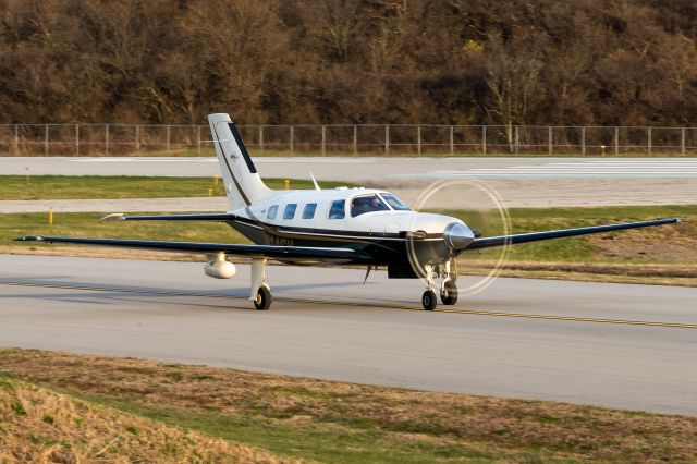 Piper Malibu Mirage (N14GV) - Malibu Meridian rolling down taxiway Hotel towards Waypoint Aviation. 