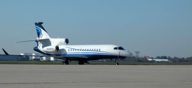 Dassault Falcon 7X (N9997X) - Catching some tarmac time is this 2008 Dassault Falcon 7X in the Autumn of 2023.