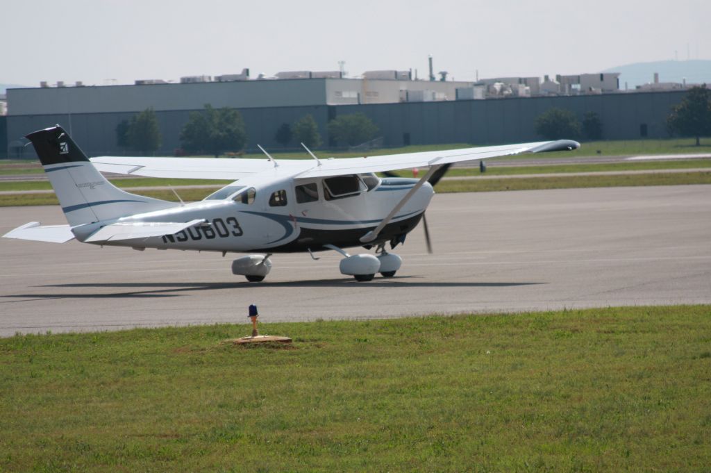 Cessna 206 Stationair (N50603) - 2009 CESSNA 206T Bruce Keller departing for Shelby County airport.  NOTE:  On a hot day Mr CESSNA himself is not running the A/C.  Saving CESSNA fuel and CESSNA customers $.
