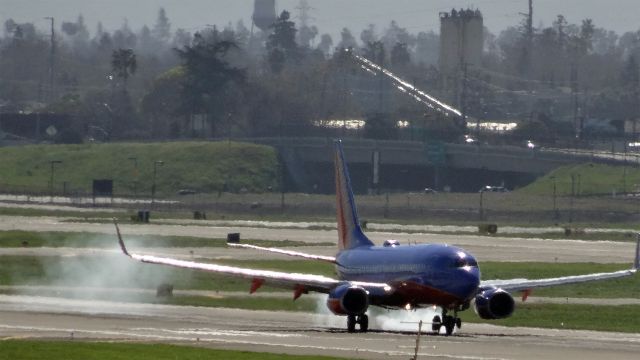 Boeing 737-700 (N255WN) - 20150225-111048.jpg