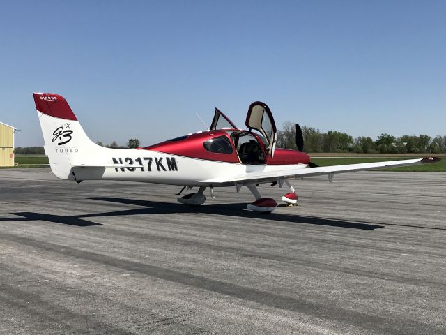 Cirrus SR-22 (N317KM) - A beautiful 2008 Cirrus SR22 g3 turbo is the lone aircraft on the ramp today.