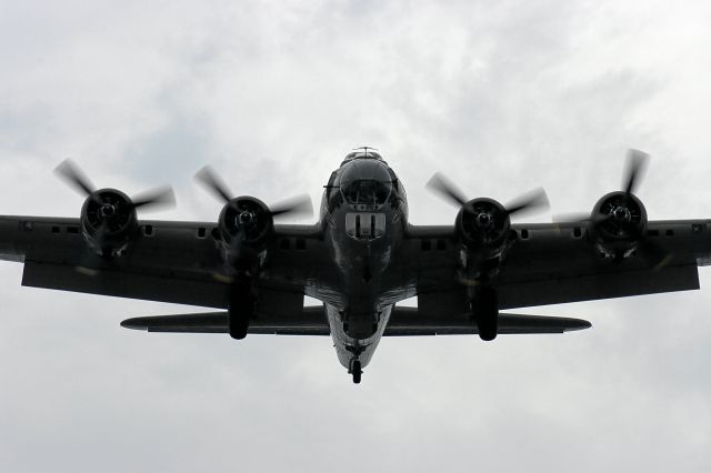 Boeing B-17 Flying Fortress — - B-17 Thunderbird Lands on Runway 27 Oshkosh EAA Week