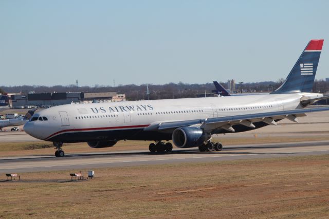 Airbus A330-300 (N273AY) - London's flight arriving to Charlotte on 1/12/2014