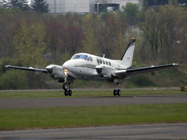 Beechcraft King Air 100 (N24EM) - Take off runway 26. The aircraft is managed by CFM Corporate Flight Management.