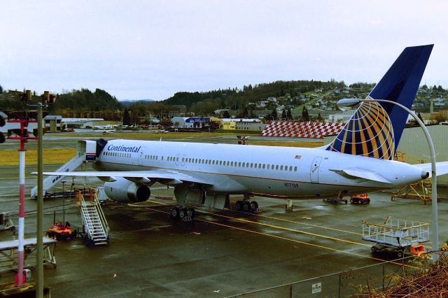 Boeing 757-200 (N17139) - KRNT - Feb 2000, back before no one ever thought of Continental would be taken over by United, this brand new 757-200 in the final stages for delivery. CN: 30352 LN:911 on the ramp at Renton, WA - I never got to smell that "new aircraft" smell, but I bet it is great. I took this from the Chamber of Commerce parking lot.