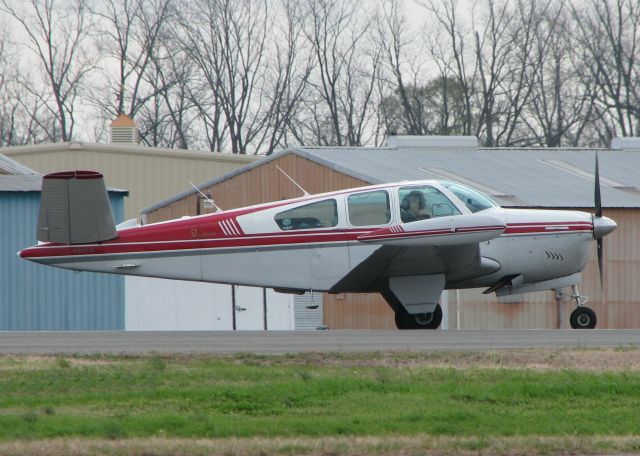 Beechcraft 35 Bonanza (N8571A) - 1949 Beech A35 turning onto runway 14 at the Shreveport Downtown airport.