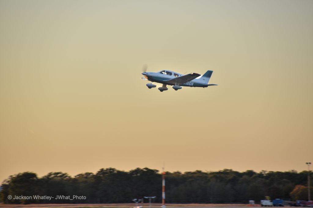 Piper Cherokee (N4186N) - Taken from the patio of Gate 12 Bar & Grill at Easterwood Airport in College Station, Texas