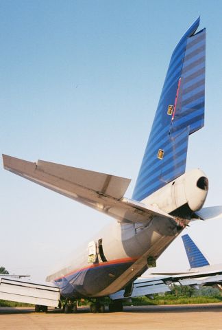 BOEING 747-100 — - Another United Airlines 747 at Greenwood-Leflore Airport, GWO, circa 2000... headed for the breaker.