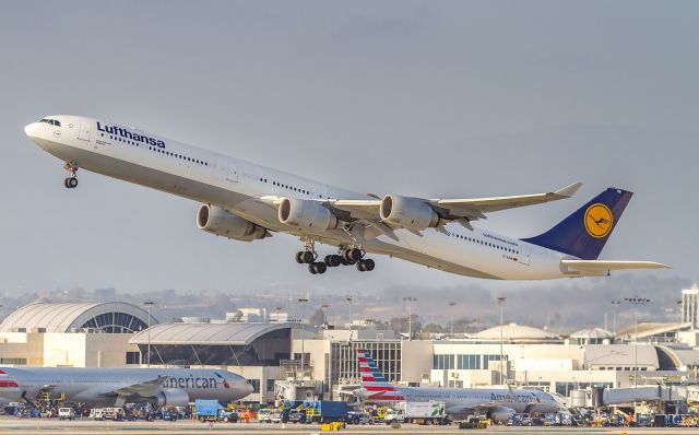 Airbus A340-600 (D-AIHM) - DLH453 climbs off runway 25R and heads back to Munich