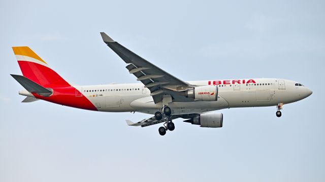 Airbus A330-300 (EC-MNL) - Iberia Airlines Airbus A330-300 (EC-MNL) arrives KBOS Rwy 22L on 7/16/2021 at 6:17 pm.