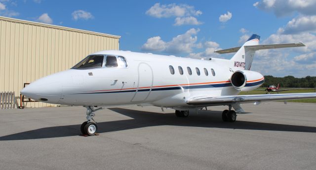 Hawker 800 (N314TC) - A 1999 model (serial number 258400) Raytheon Hawker 800XP at Boswell Field, Talladega Municipal Airport, AL, during the 2023 NASCAR YellaWood 500 @ Talladega Superspeedway - October 1, 2023.