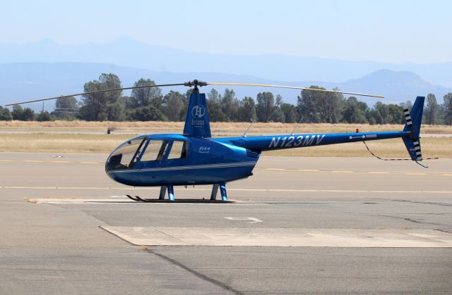 Robinson R-44 (N123MV) - KRDD - Inland Helicopter from Spokane, WA on the ramp at Redding - 4 seconds after I got my shots, a Redding fuel truck pulled up this side of the helo and blocked my view! I was lucky!. click full for large view.