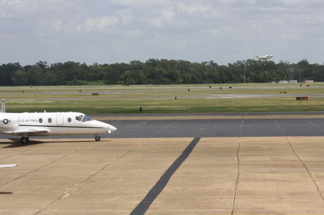 Beechcraft Beechjet — - USAF Hawker 400s doing Touch-n-gos at KMLU