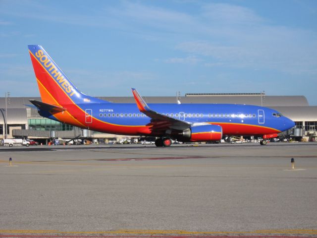 Boeing 737-700 (N277WN) - Holding on RWY 19R