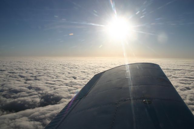 Piper Cherokee (N6671W) - On top in the morning. En route to Austin, TX.