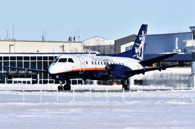 Saab 340 (C-FPCU) - Pacific Coastal Airlines Saab 340B departing YYC on Mar 3.