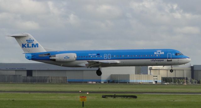 Boeing 737-700 (PH-OFP) - A KLM Cityhopper Fokker 100 landing at Schiphol.