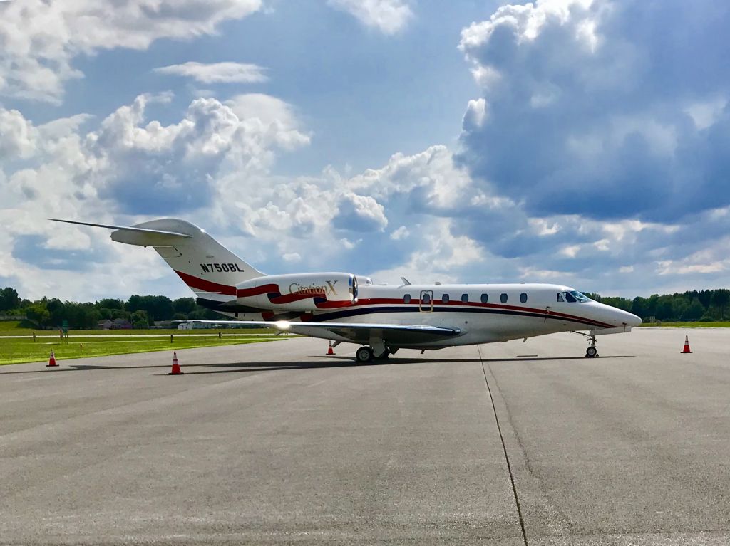 Cessna Citation X (N750BL) - Resplendent in the afternoon sun  at Million Air KSYR 7.29.2018