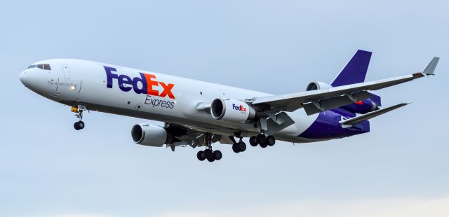 Boeing MD-11 (N598FE) - FedEx MD-11, N598FE, operating as flight FDX9731, arrived into Manchester-Boston Regional Airport after a multi-stop journey that began yesterday in Shanghai, China. The aircraft is delivering 91,000 pounds of PPE for the area hospitals all thanks to local inventor and businessmen Dean Kamen.br /br /Shot with a Nikon D3200 w/ Nikkor 70-300mmbr /Best viewed in Full Size