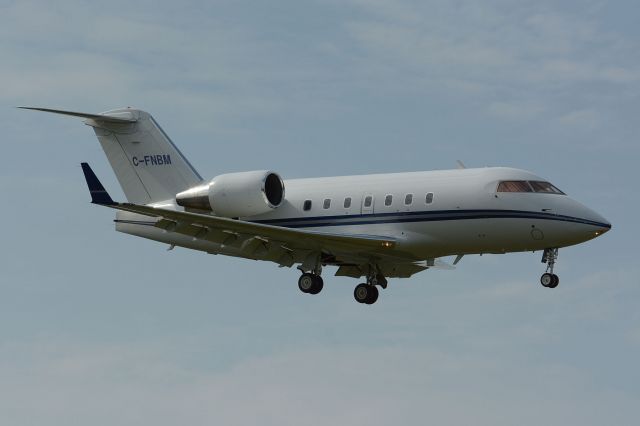 Bombardier Challenger 300 (HRT85) - On final to 06L in CYHU. 14-09-2021