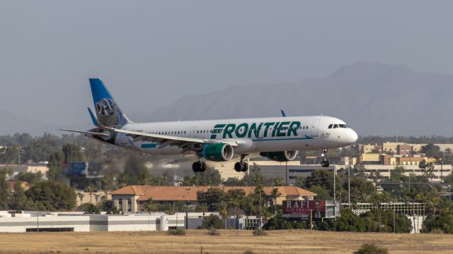 Airbus A321 (N708FR) - Frontier Airlines A321 landing at PHX on 5/1/2022. Taken with a Canon 850D and Canon 75-300mm lens.