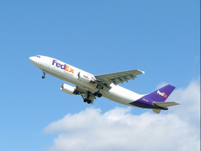 — — - FedEx A300 on takeoff from 26L