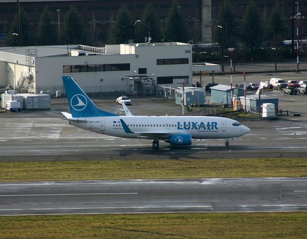 Boeing 737-700 (LX-LGS) - KBFI - A new 737-7 (33965/1634) on Jan 24th, 2005 arriving at Boeing Field after a pre-delivery test flight and on taxi back to the Boeing Flightline.