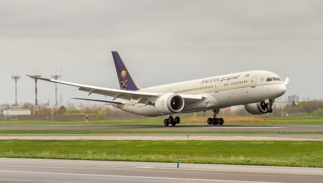 Boeing 787-9 Dreamliner (HZ-ARE) - My first glimpse of the new Saudi 789! Replaces the 777s. Here landing on runway 33L on a grey day at YYZ