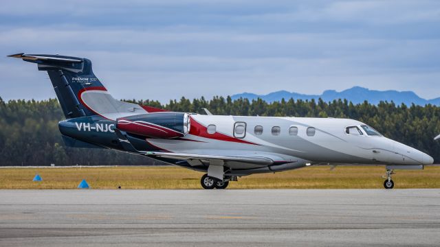 Embraer Phenom 300 (VH-NJC)