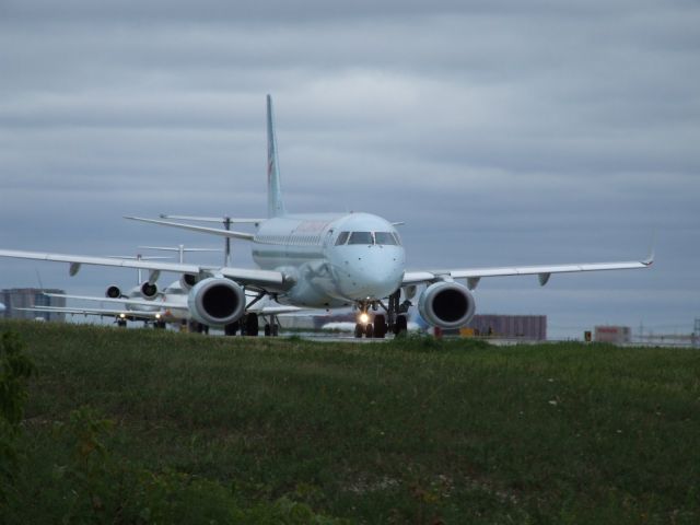 Embraer ERJ-190 (C-FHJU) - Gotta love the "whiskers" on this E190. Heading to Halifax CYHZ off 06L