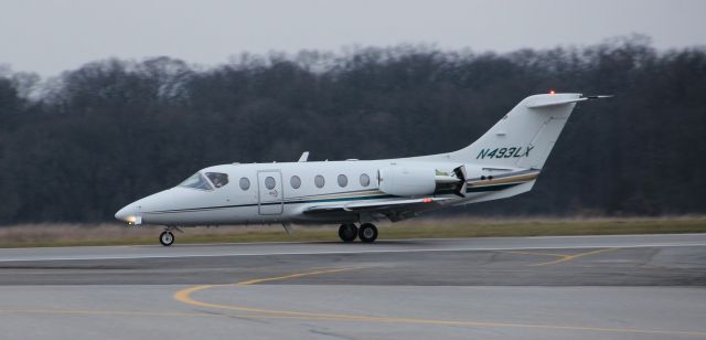 Beechcraft Beechjet (N493LX) - Landing rwy 27 on 12/27/11...