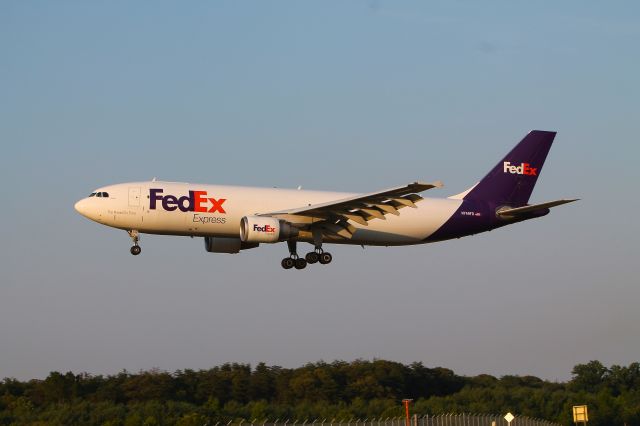 N749FD — - On July 7, 2012 I caught this Airbus A300 landing on runway 33L at BWI in the setting evening sun.  This was taken from the Thomas Dixon Observation area on Dorsey road.