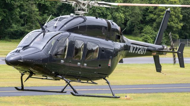 Bell 429 GlobalRanger (N772UT) - N772UT getting pretty close to me as it turns to park on the grass at College Park Airport