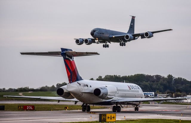 Boeing 717-200 (N970AT) - Delta 717-200 holding short of runway 23L as a KC-135 is on short final!