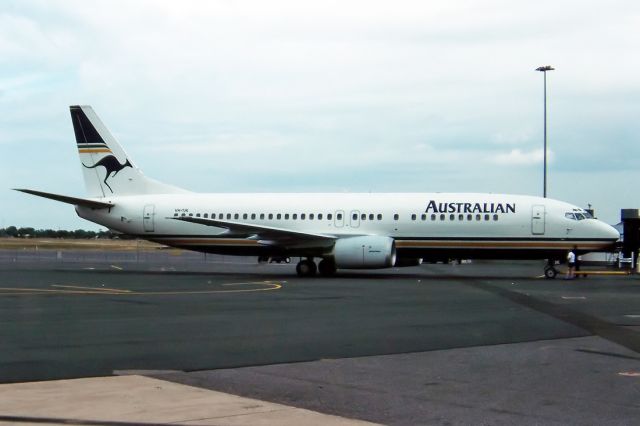 BELL-AGUSTA AB-139 (VH-TJK) - AUSTRALIAN AIRLINES - BOEING 737-476 - REG : VH-TJK (CN 24436/1998) - ADELAIDE INTERNATIONAL SA. AUSTRALIA - YPAD (23/1/1993) 35MM SLIDE CONVERSION.