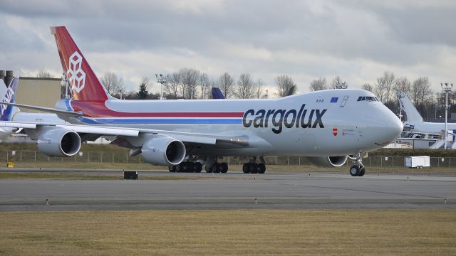 BOEING 747-8 (LX-VCA) - BOE501 taxis onto runway 16R for a flight test on 1/25/13. (LN:1420 c/n 35808).