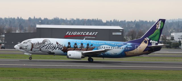 BOEING 737-400 (N705AS) - Alaska Airlines is marking the 50th anniversary of Alaska statehood with a Were all pulling together scheme applied to this Boeing 737-400 (N705AS, dubbed Spirit of Alaska Statehood). The winning design in a statewide Paint the Plane contest was created by 16-year-old Hannah Hamberg from Sitka. Aviation Technical Services of Everett, Washington, completed the complicated 21-color painting process, which took 14 days.